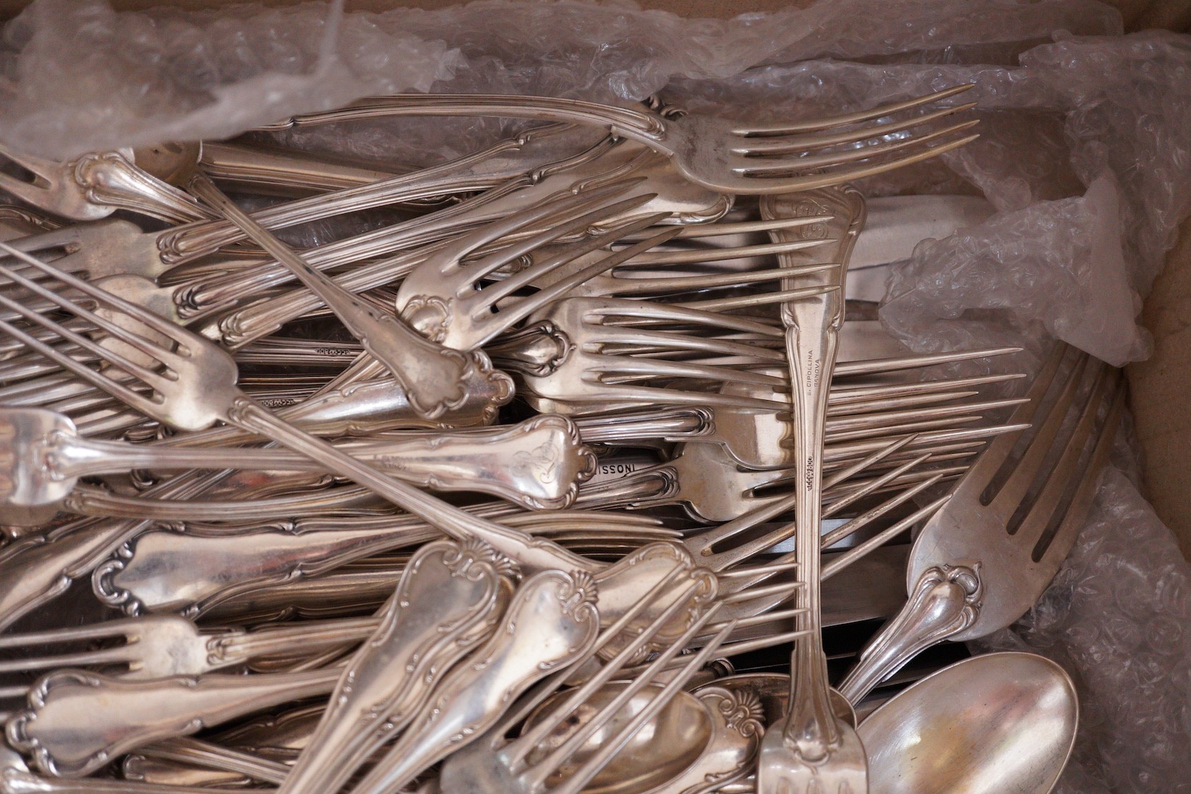 A harlequin part canteen of mainly early 20th century Italian 800 standard white metal Venetian pattern cutlery, comprising eighty items